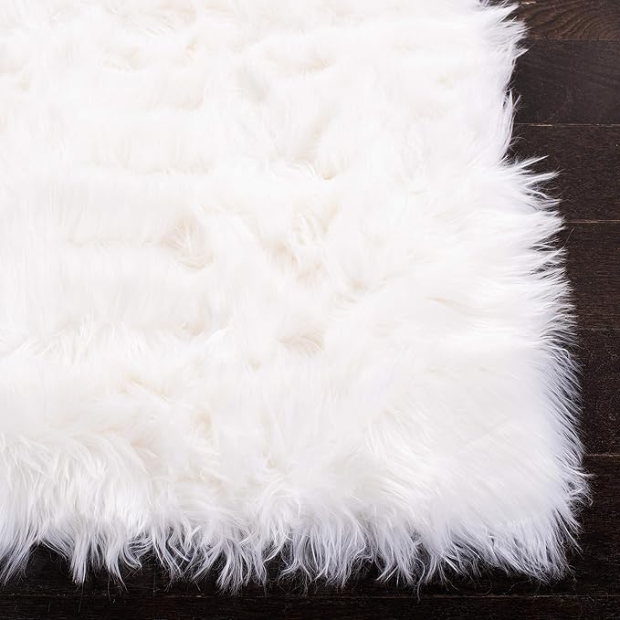 SAFAVIEH Faux Sheep Skin Collection Area Rug - 6' x 9', Ivory, Silken Glam Design, Non-Shedding & Easy Care, 2.35-inch Thick Ideal for High Traffic Areas in Living Room, Bedroom (FSS235A)