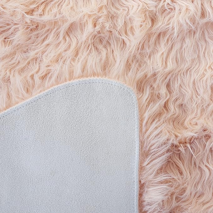SAFAVIEH Faux Sheep Skin Collection Area Rug - 5' x 7', Light Pink, Silken Glam Design, Non-Shedding & Easy Care, 2.35-inch Thick Ideal for High Traffic Areas in Living Room, Bedroom (FSS115U)
